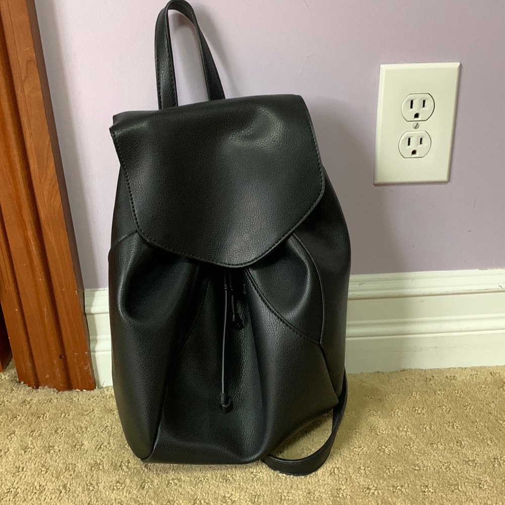Forever 21 Plain Black Designer Backpack with Gold detailing